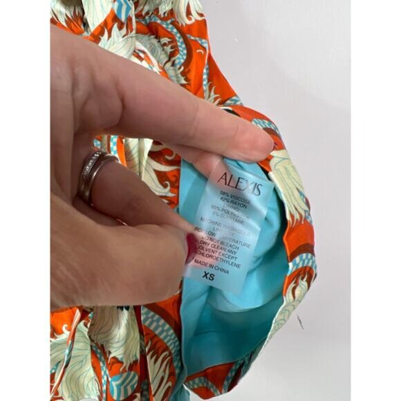 NEW Alexis Kerissa Floral Print V-Neck Orange and Cream Sleeveless Romper - Picture 6 of 9